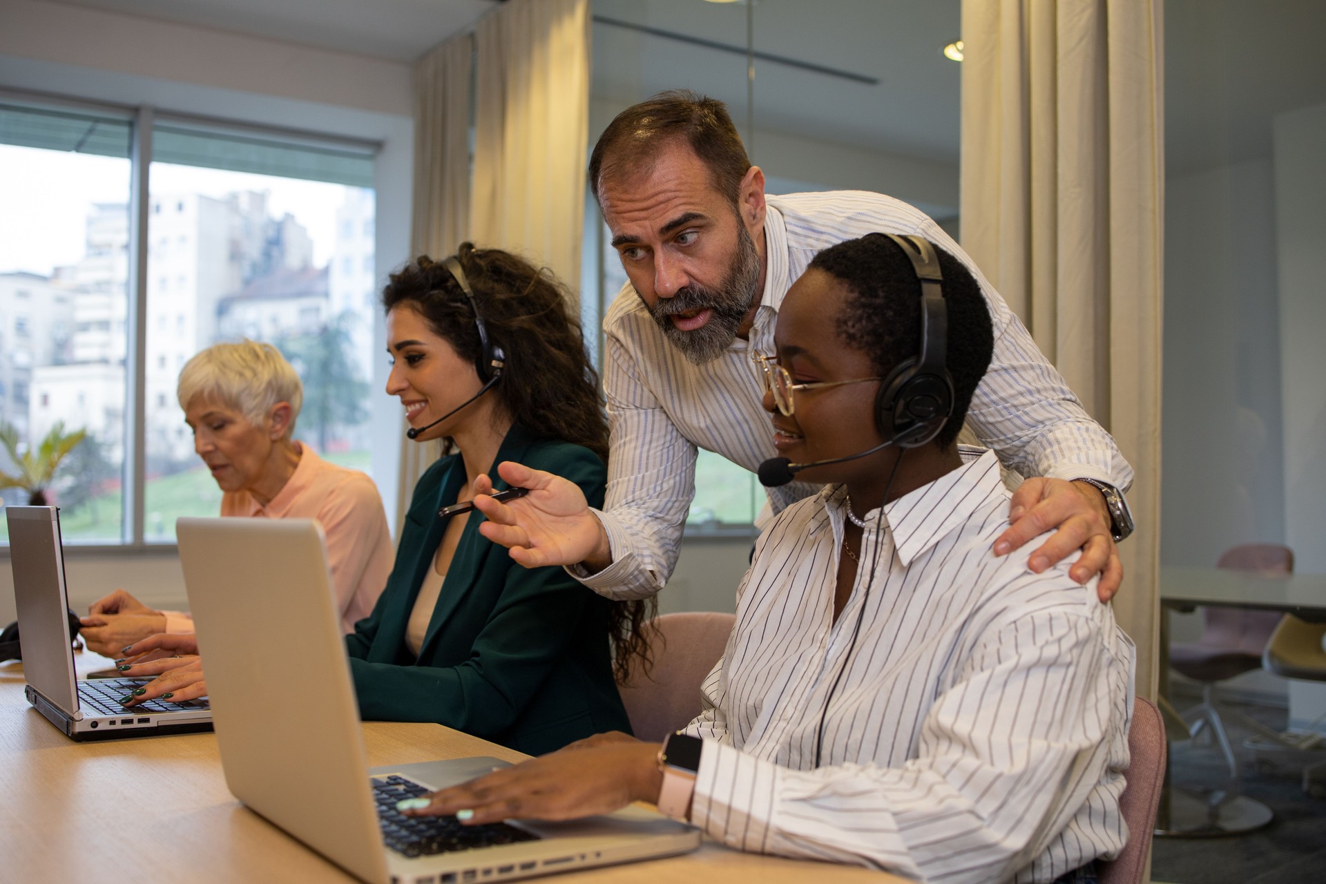 Call center operators working in the office